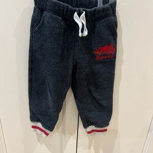 Roots Kids Black Jogger Pants with Red Logo